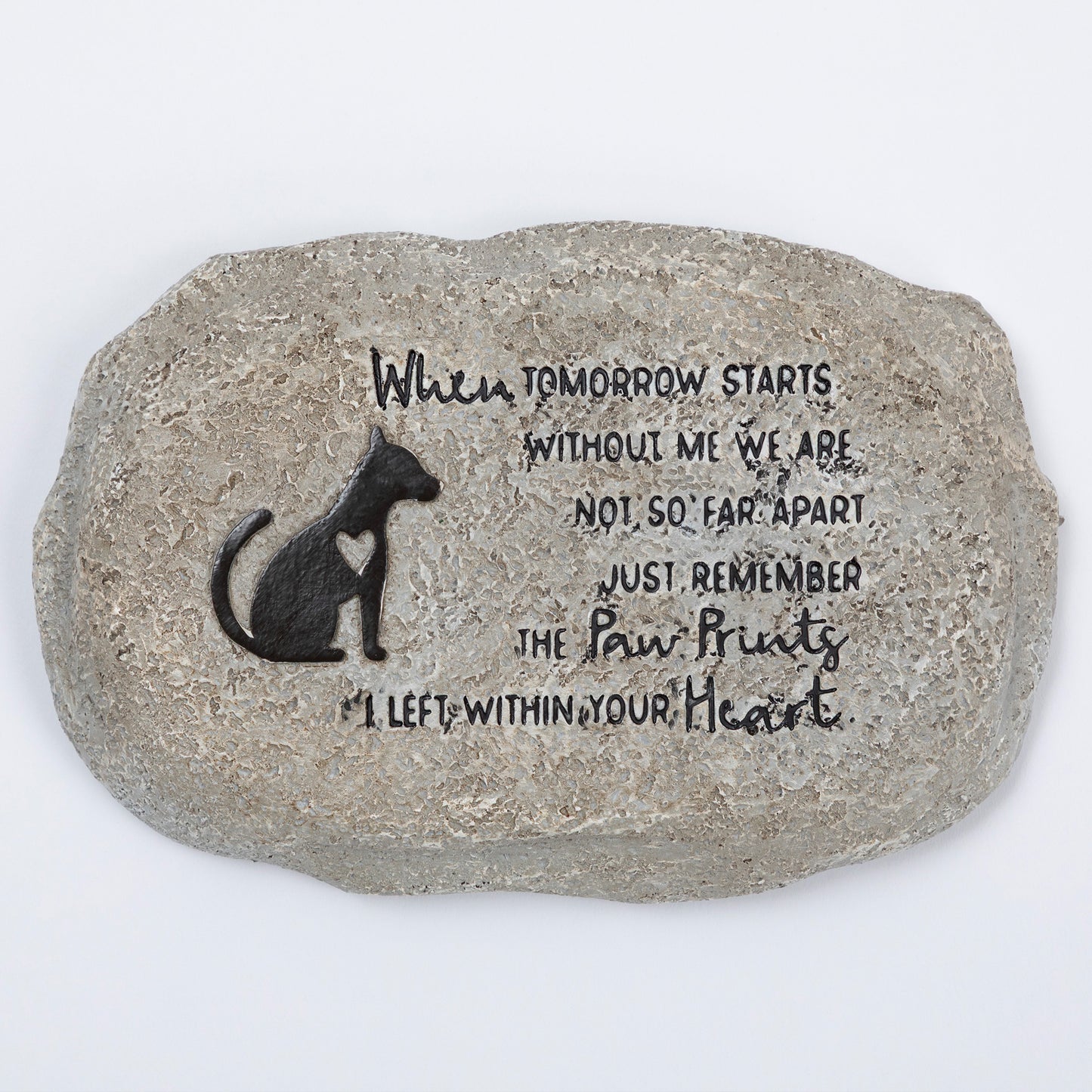 Decorative stone with a dog silhouette and engraved text on a white background