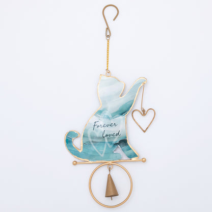 Decorative chime with a cat silhouette and 'Forever loved' text on a light blue background.