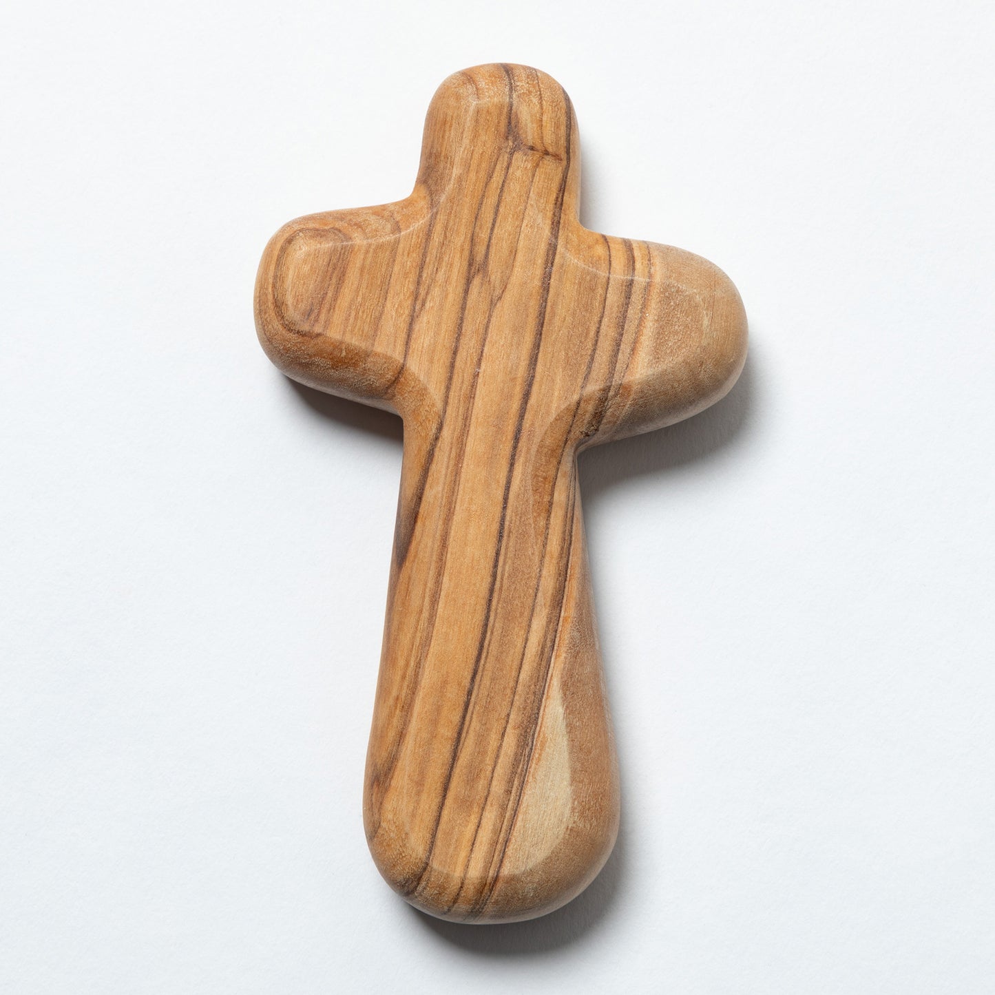 A handcrafted wooden cross with a polished olive wood grain pattern, shown on a clean white background.