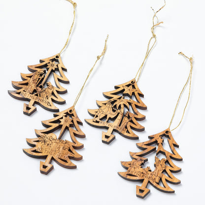 Three wooden Christmas tree ornaments with hanging twine and engraved nativity scenes on a clean white background.
