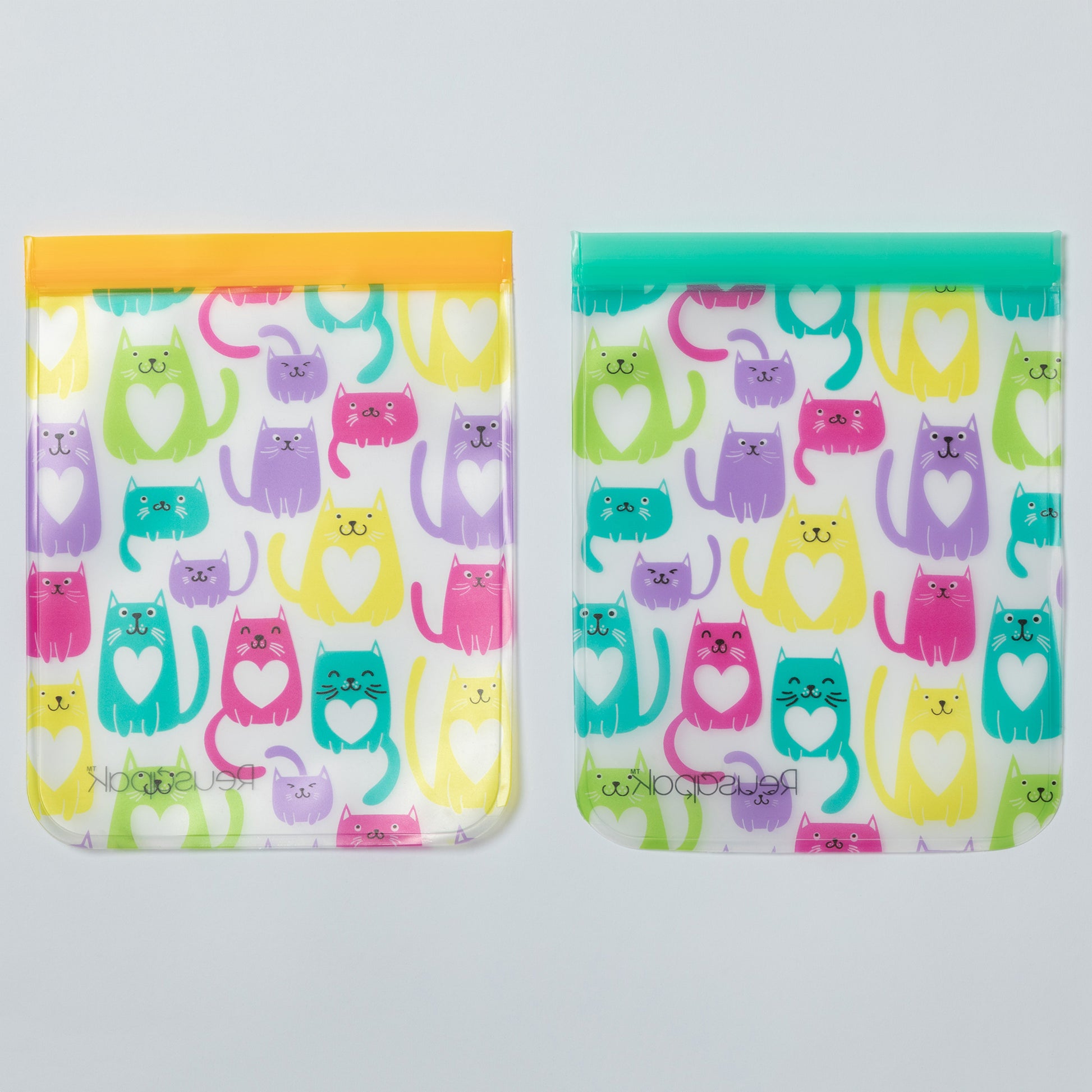 Two colorful reusable pouches with cat pattern on a gray background