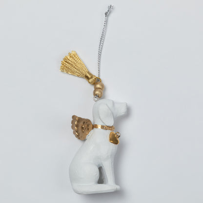 A white angel dog ornament with gold wings, collar, and tassel, hanging from a silver chain against a light gray background.