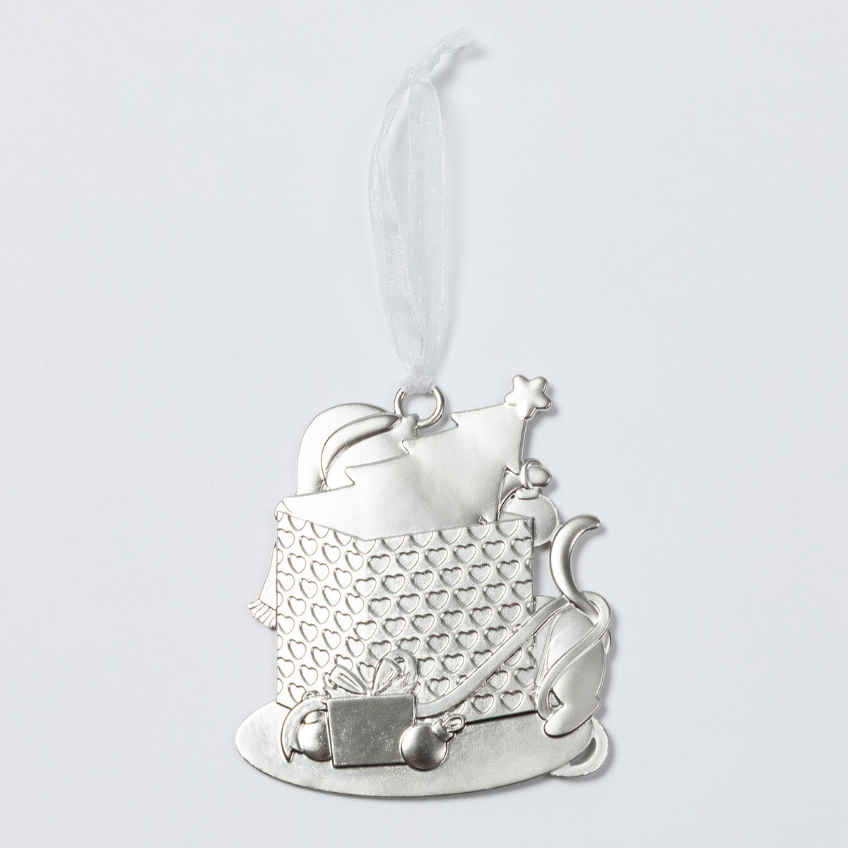 A silver-toned Christmas ornament shaped like a sleigh carrying wrapped presents, with a white hanging ribbon, shown on a light gray background.