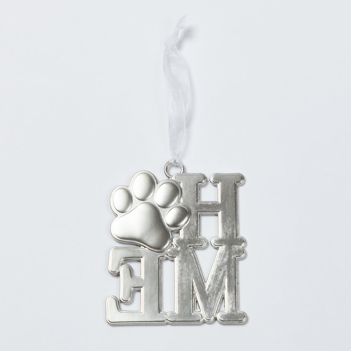 A silver metal pet memorial ornament featuring a paw print over the letters 'HOME', suspended from a white ribbon against a light gray background.