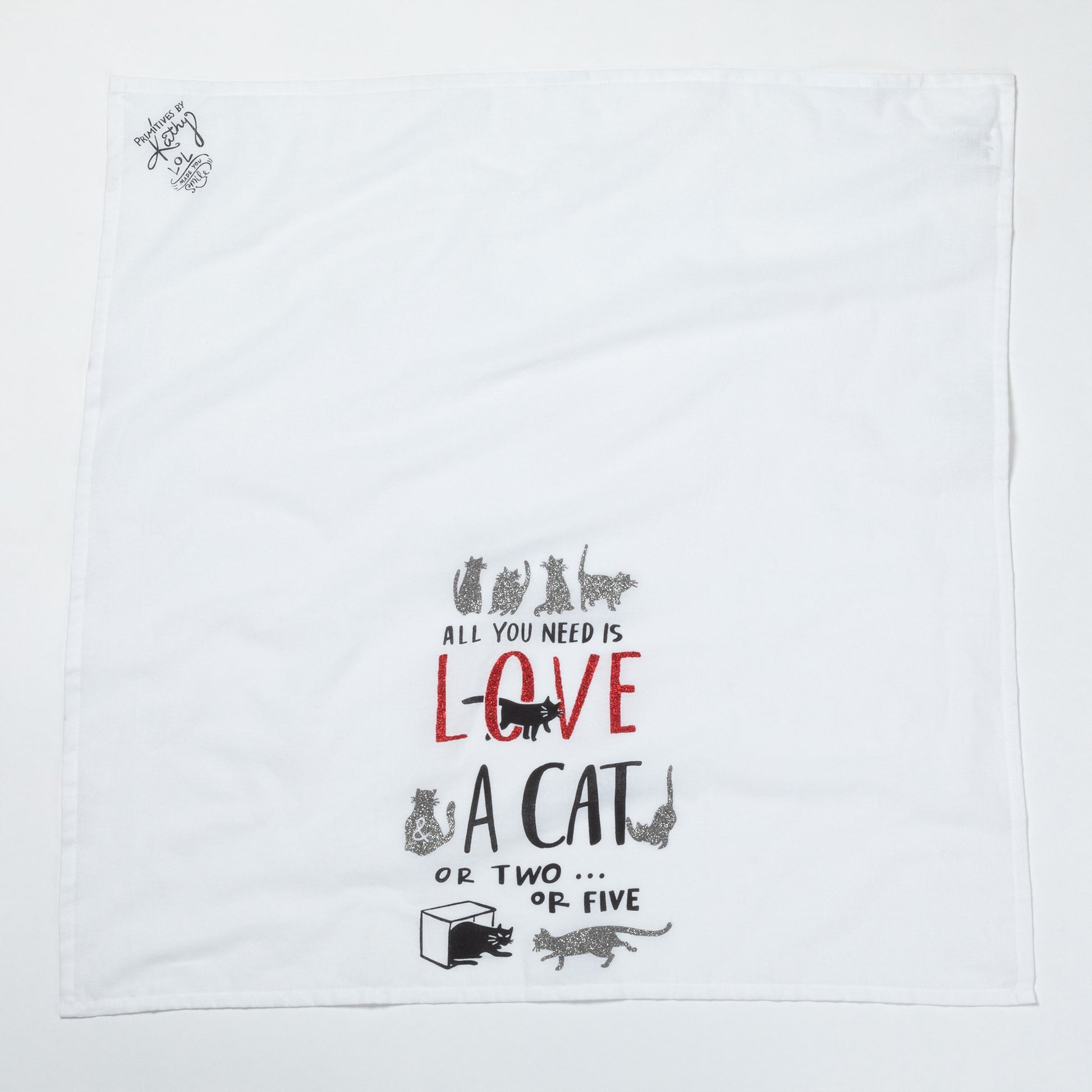 White towel with black text and cat illustrations on a white background