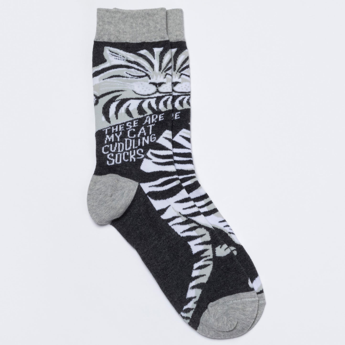 Sock with striped cat pattern and text on a white background