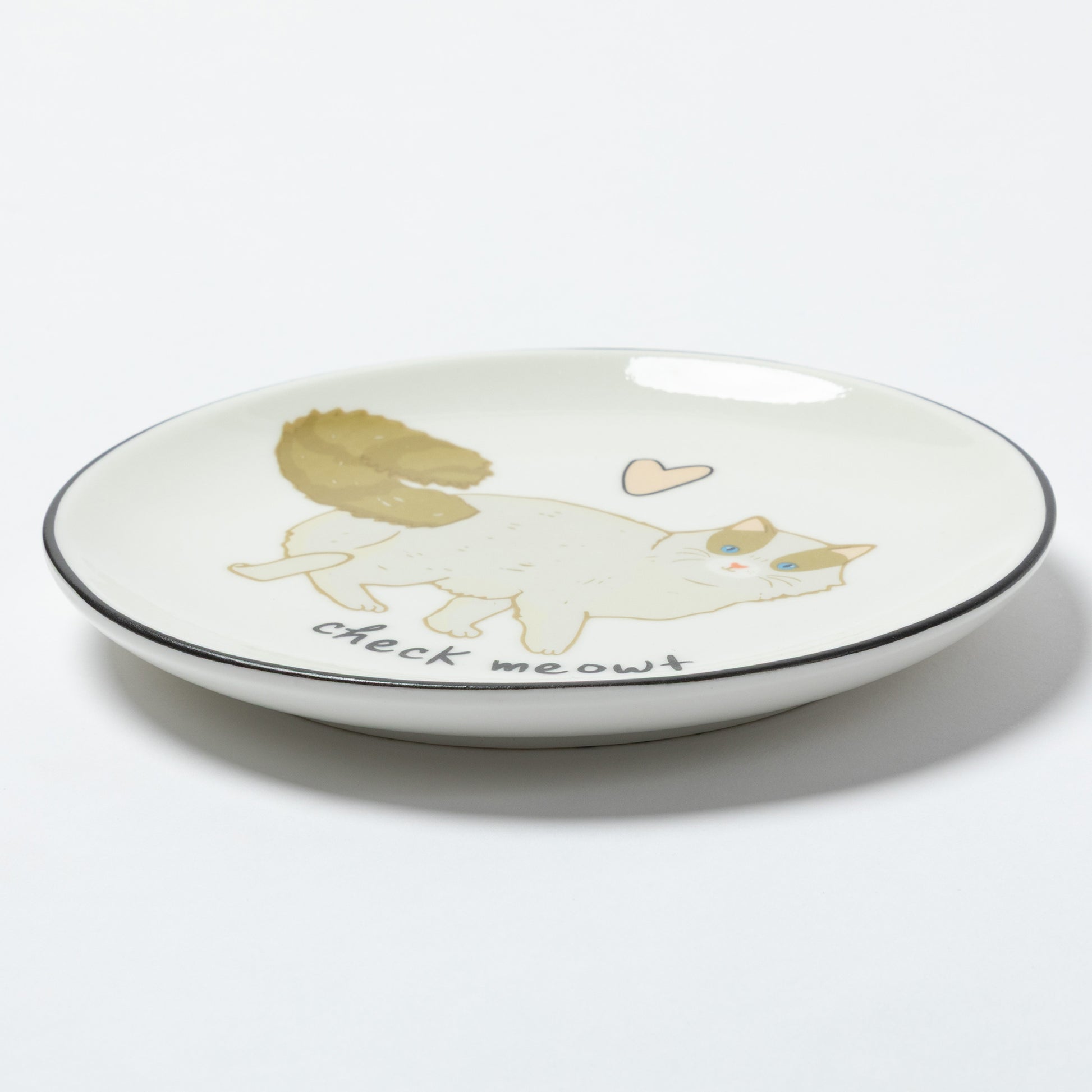 A white ceramic plate with a black rim, featuring a cute illustration of a white cat with a gold tail, a small pink heart, and the text 'check me out' in black script.