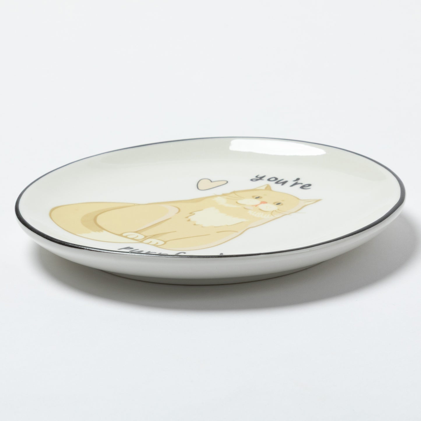 A white ceramic shallow plate with a black rim, featuring a cartoon illustration of a yellow cat and the word 'you're' printed on the side, set against a plain white background.