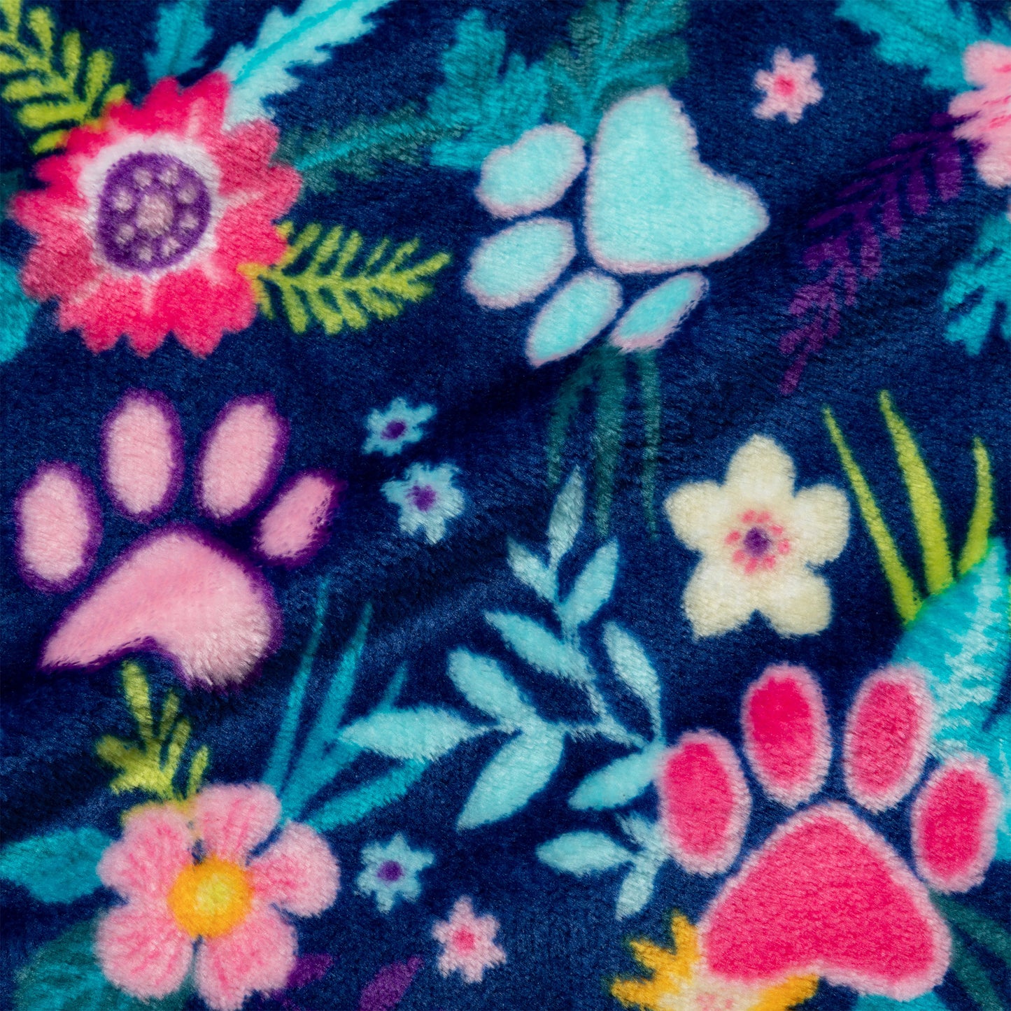 Floral and paw print pattern on a dark blue background