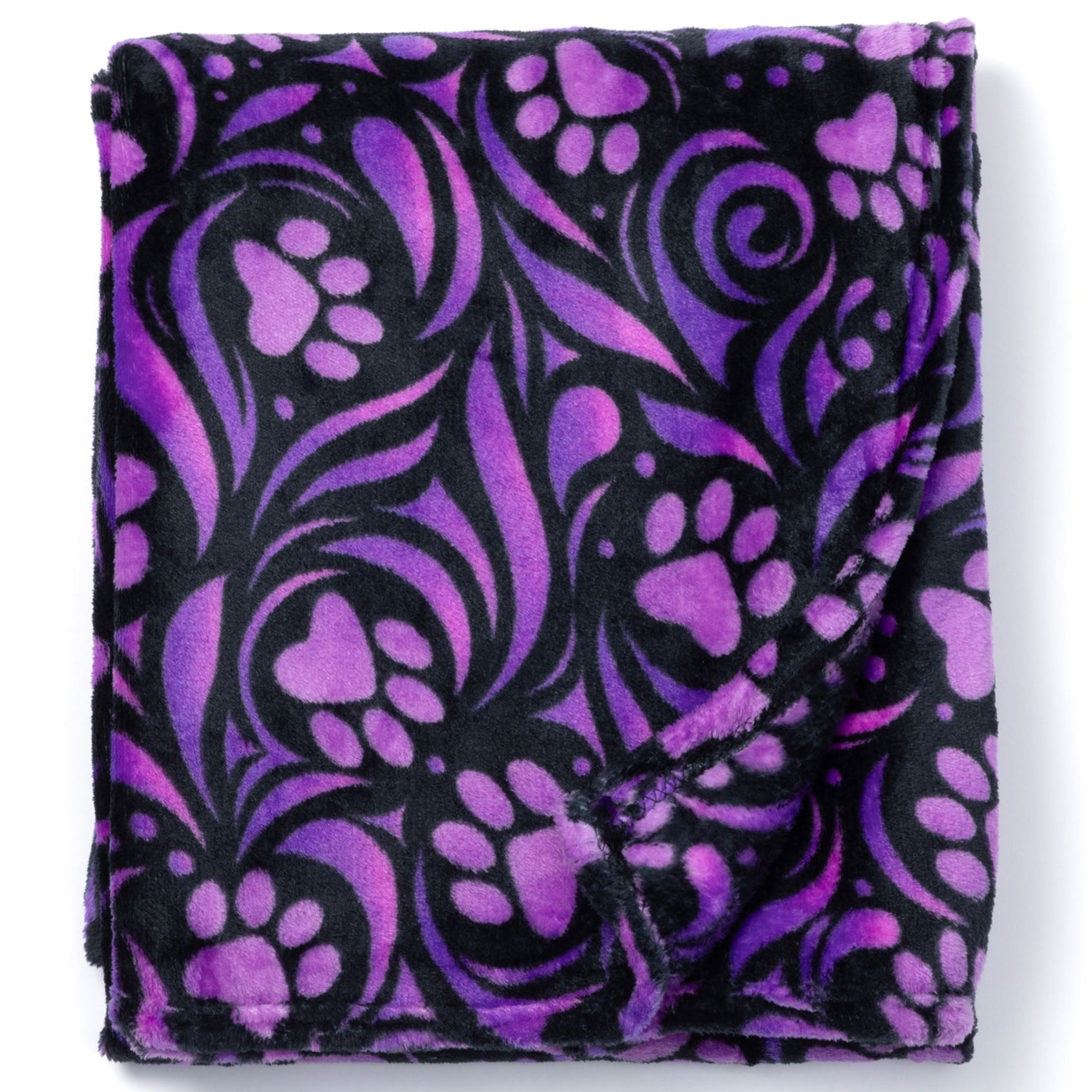 Folded purple and black patterned blanket on a white background
