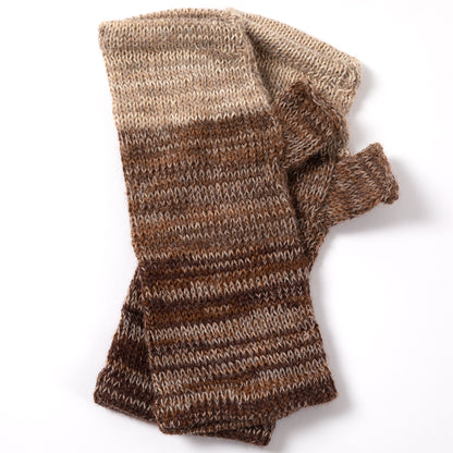 a pair of alpaca fingerless mittens in shades of brown made from alpaca wool on a white background