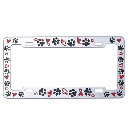 License plate frame with paw and heart designs on a white background