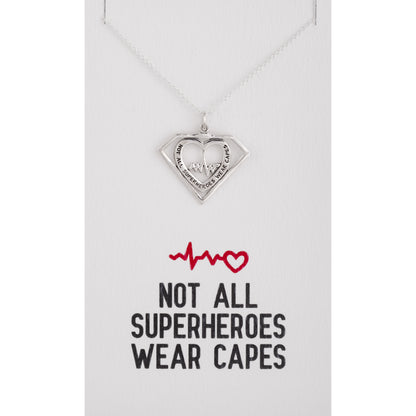 Heart-shaped sterling pendant necklace on a card with text 'Not all superheroes wear capes'.