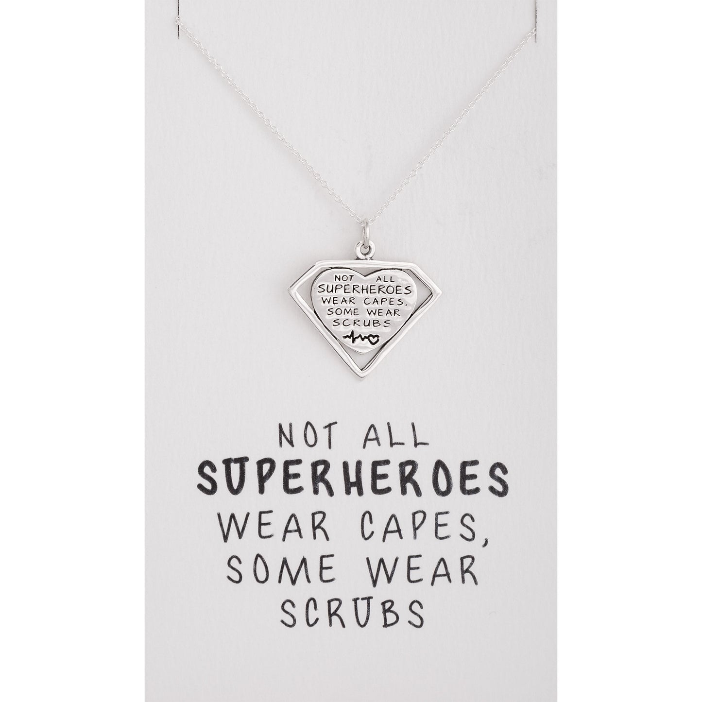 Necklace with a heart-shaped pendant on a white card with text.