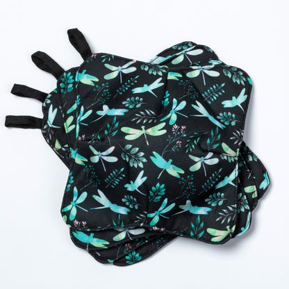 A set of four bowl cozies with various patterns, including a dragonfly design, Dragonfly Garden