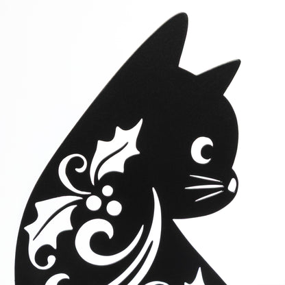 Black silhouette of a cat with decorative patterns on a white background