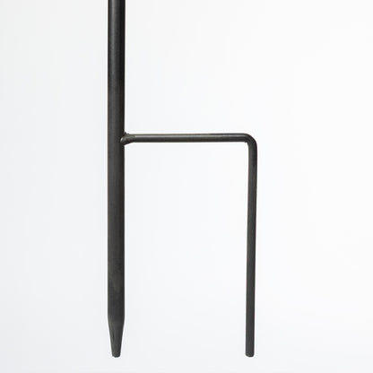 Black metal stake end on a white background