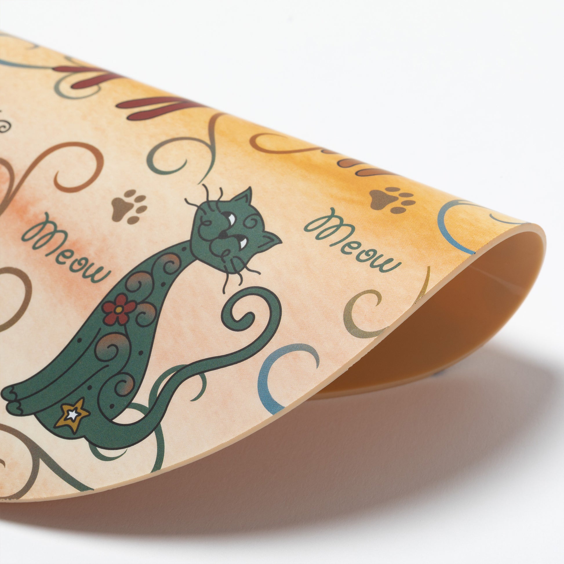 Silicone non-slip jar opener with a cat design and 'meow' text on a white background