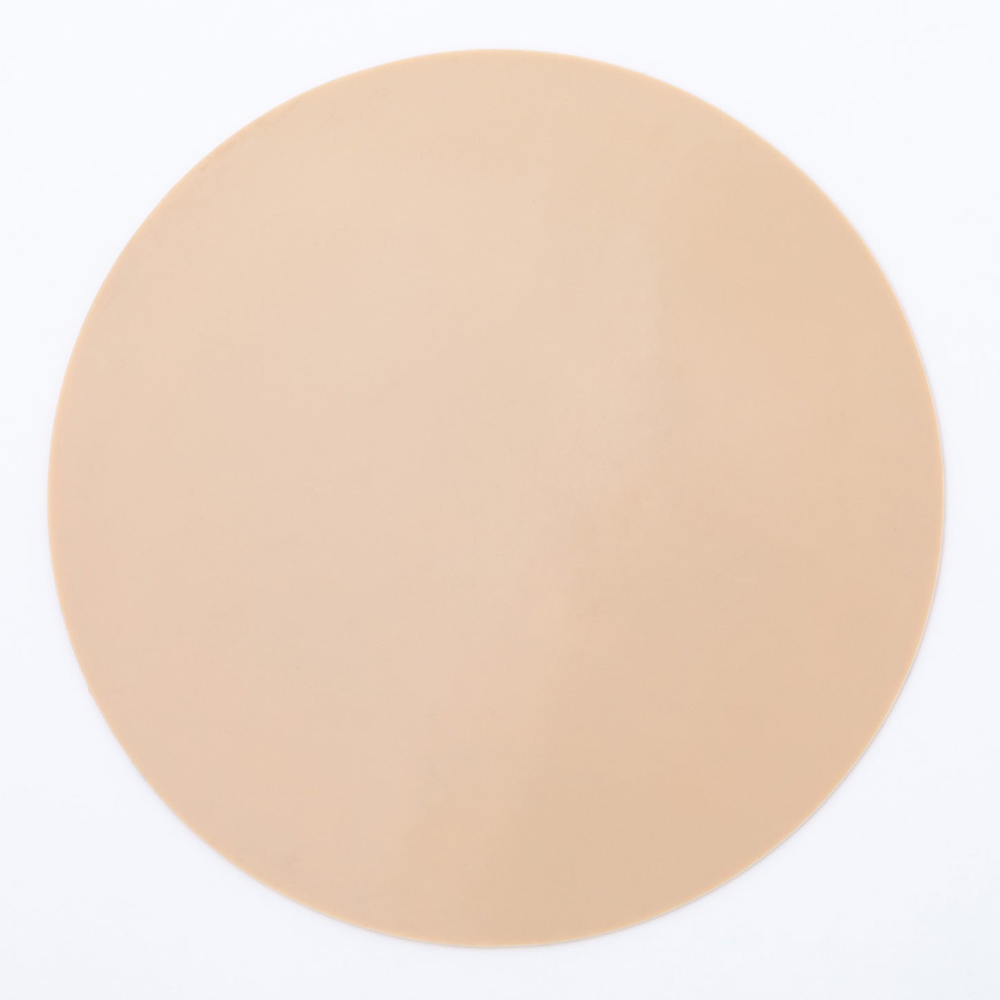 The beige back of a silicone non-slip jar opener 