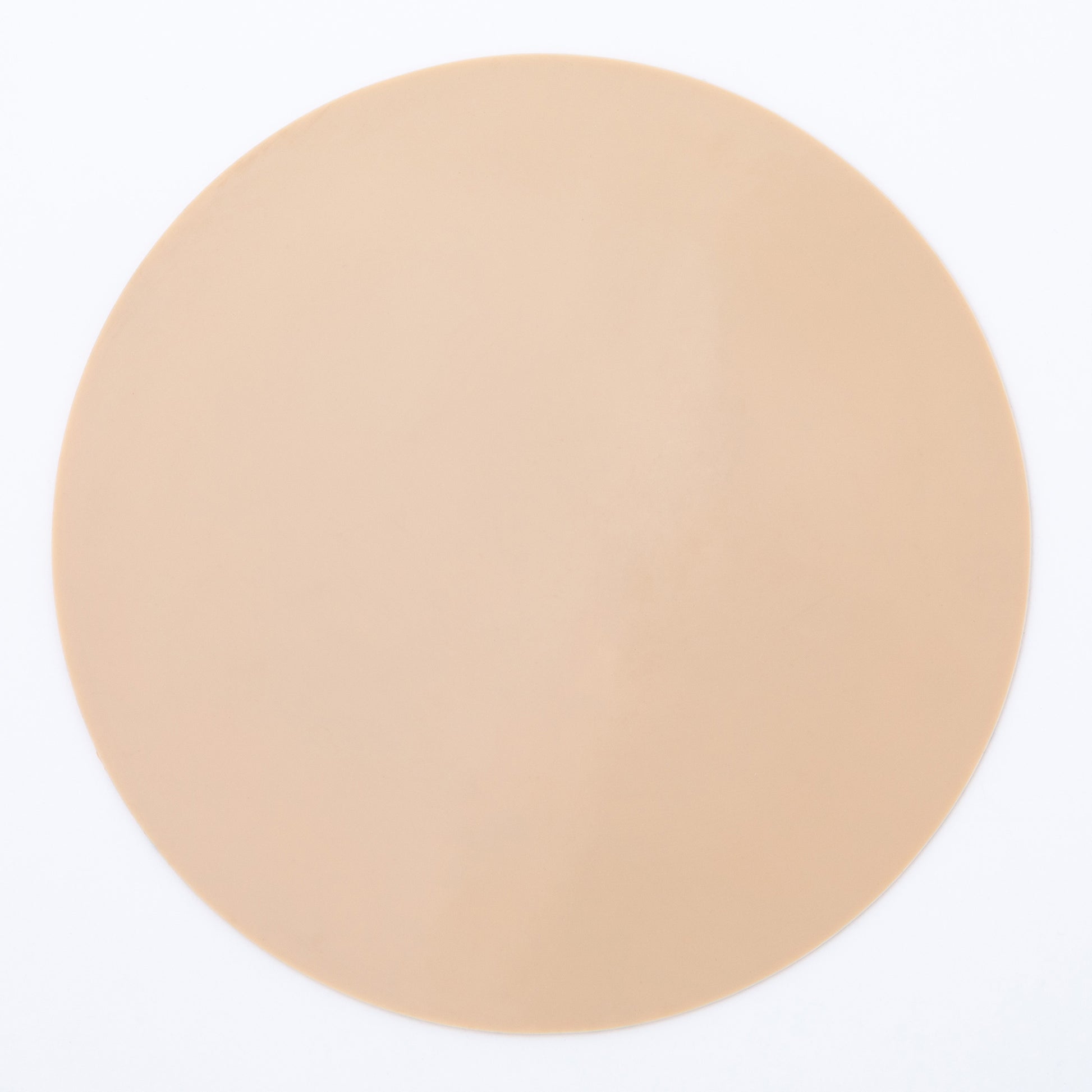 The beige back of a silicone non-slip jar opener 