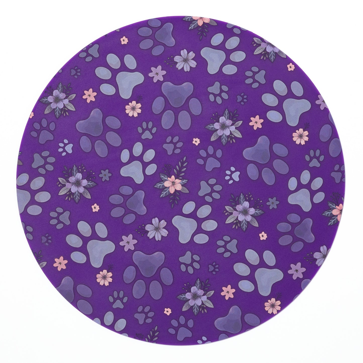 Silicone non-slip jar opener with flowers and paw prints on a purple background.