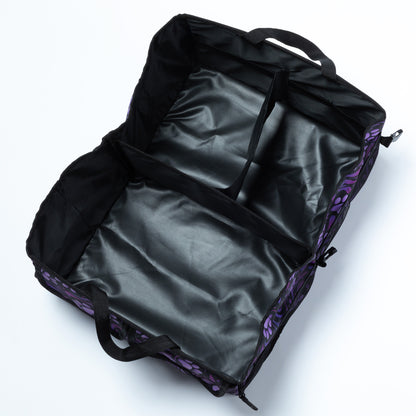 View from above showing the 3 large compartments of the paw printed car trunk organizer.