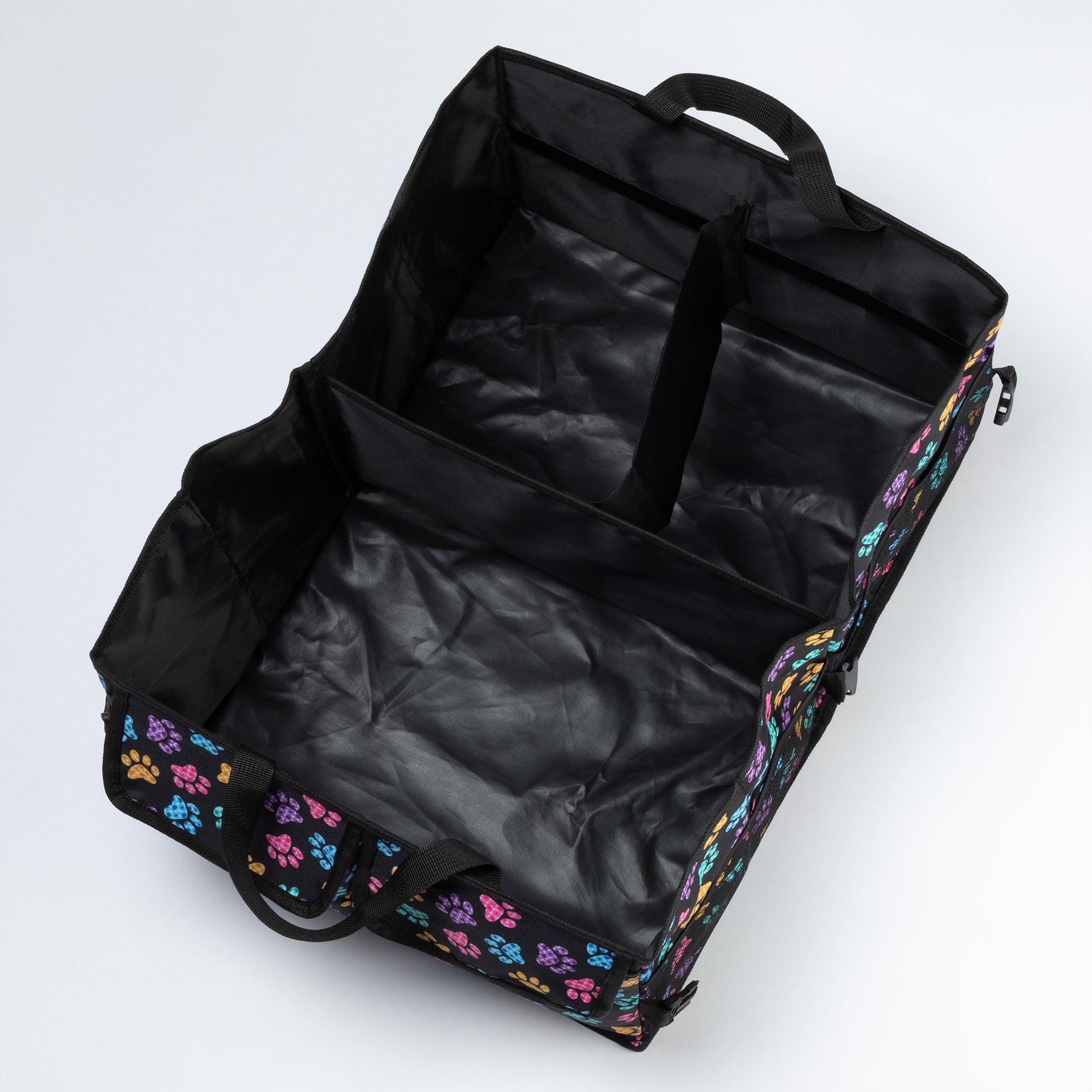 View from above showing the 2 large compartments of the paw printed car trunk organizer.
