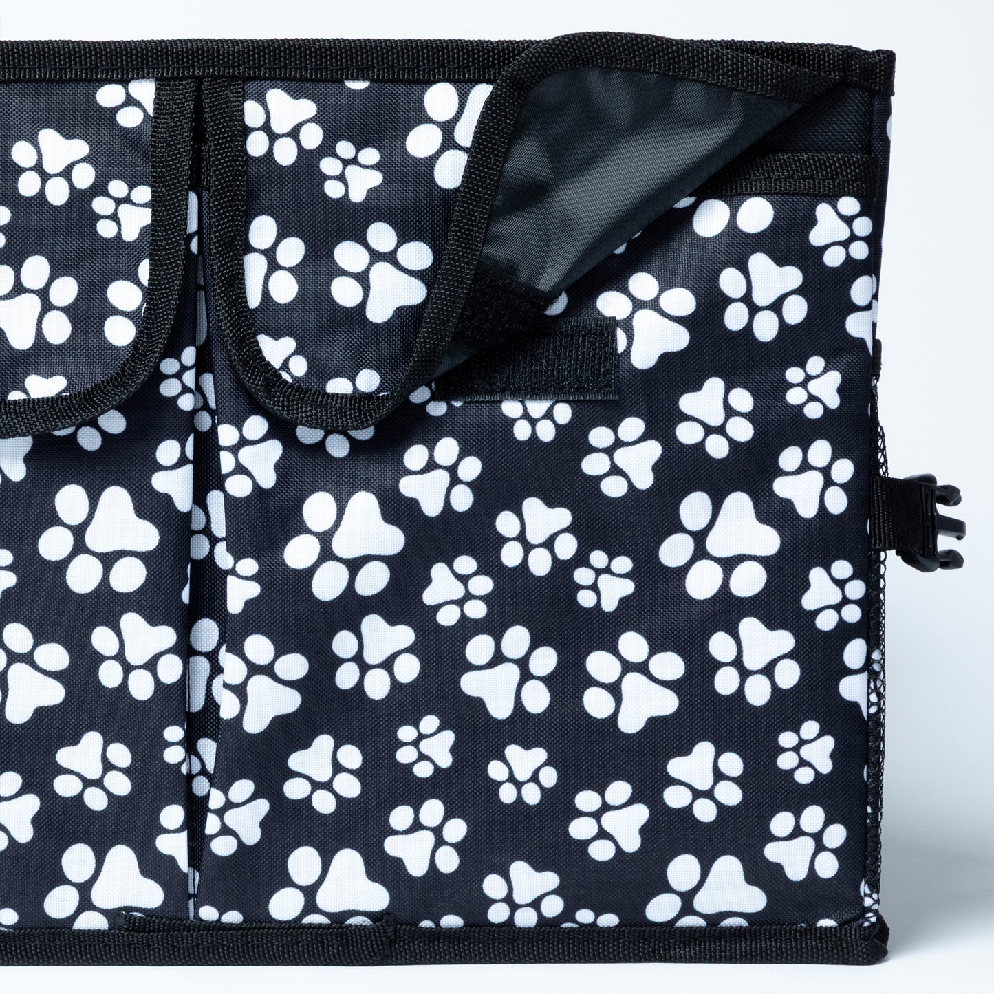 Close up of front pocket on a collapsible car trunk organizer.