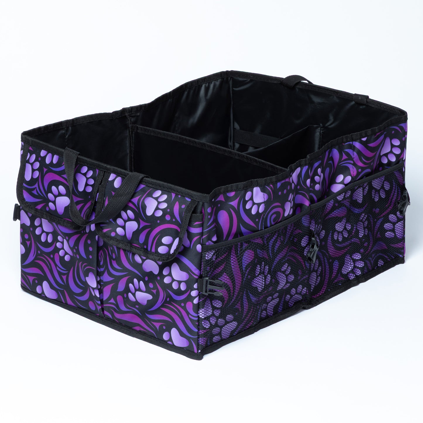 A collapsible car trunk organizer with purple paw prints and a purple and black swirl design, on a white background.