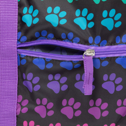 Duffel bag with purple and blue paw print pattern on a black background