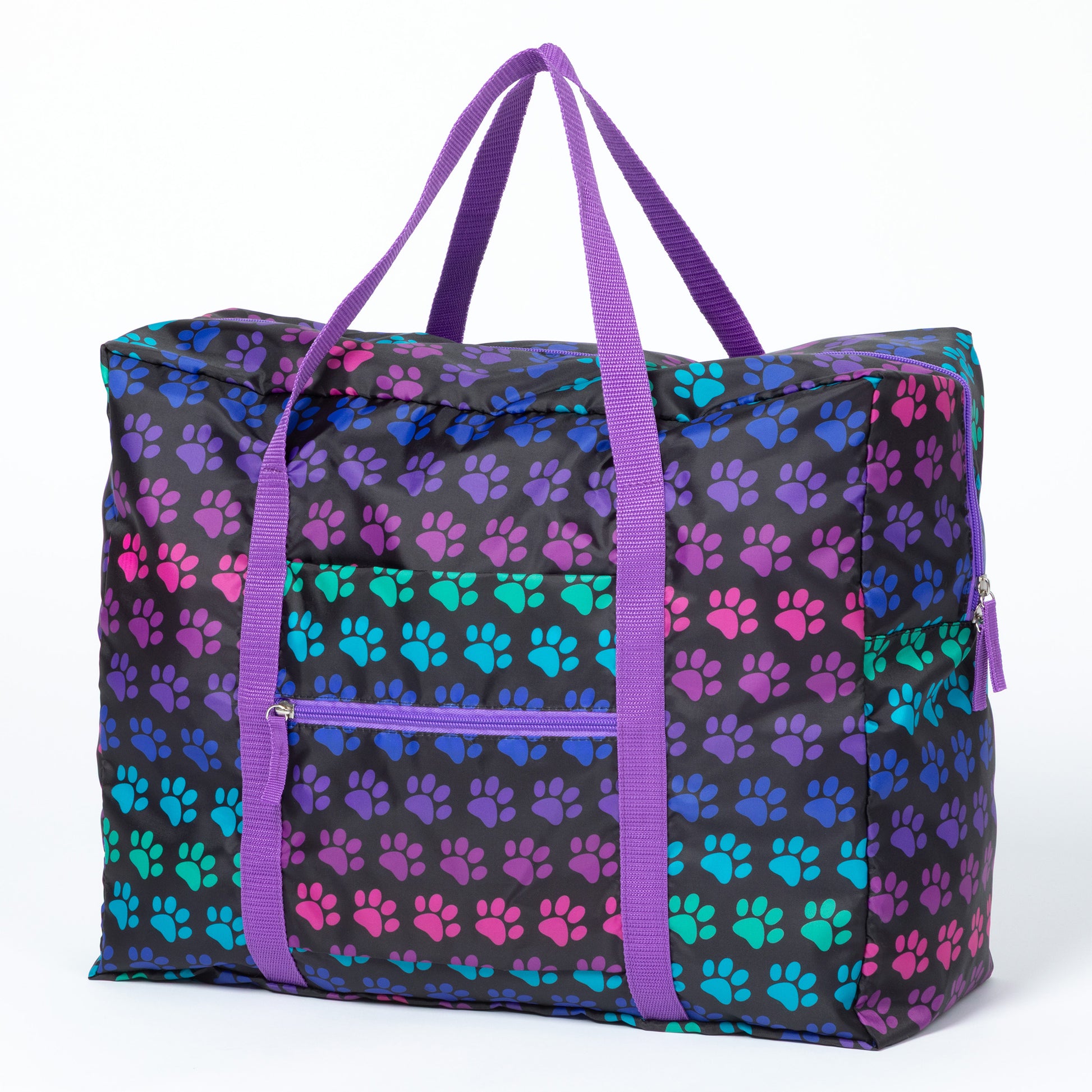 Large duffel bag with colorful paw print pattern on a white background