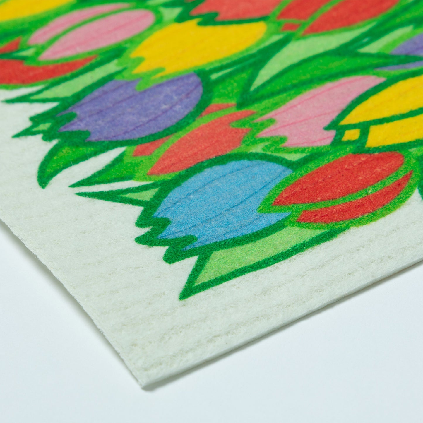 Colorful tulip pattern on a reusable swedish dishcloth