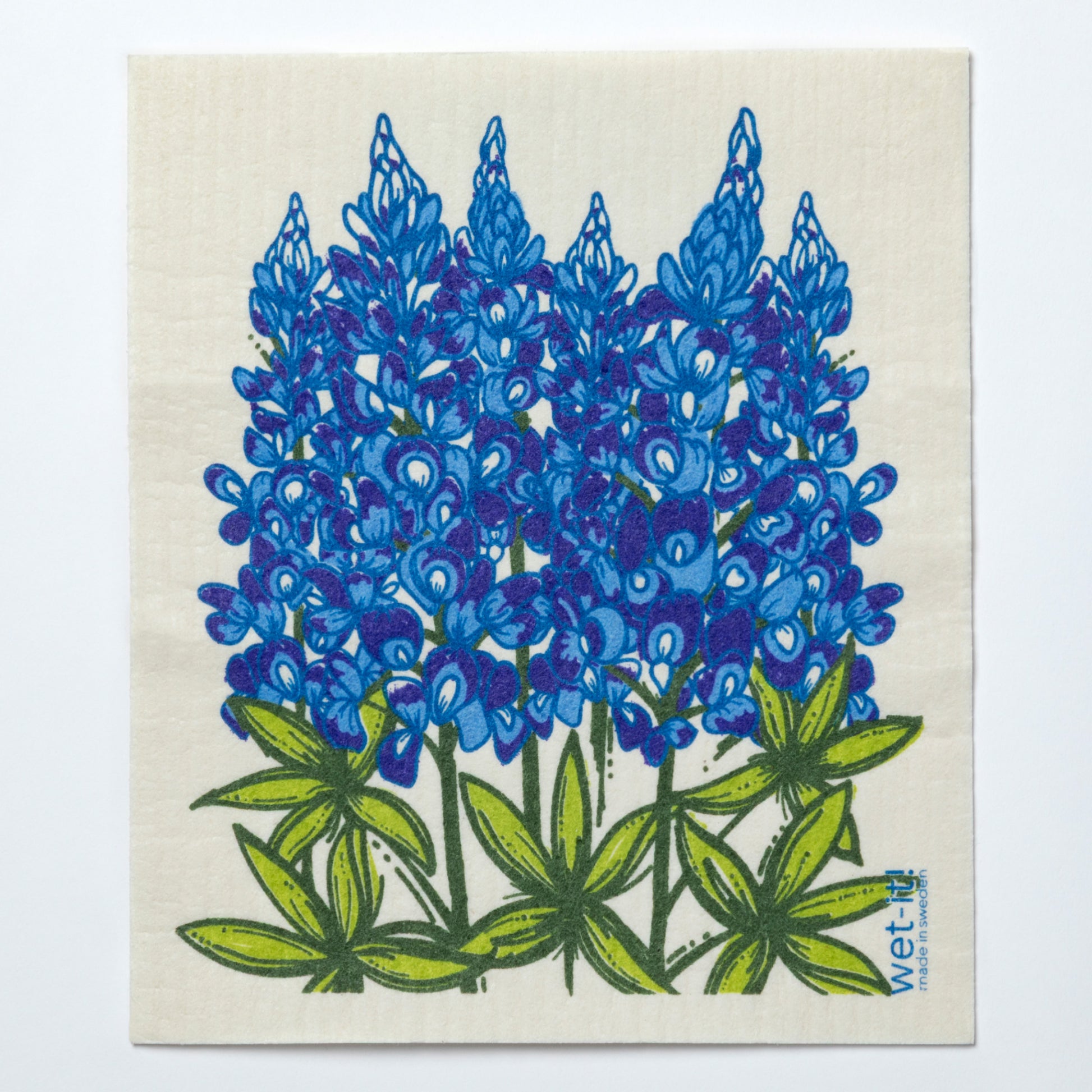Reusable dishcloth with bluebonnet design on a white background