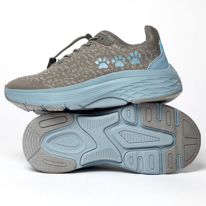 Gray and blue running shoes with paw print design on a white background.