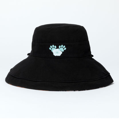 Black wide brim sun hat with a light blue paw print design on a white background