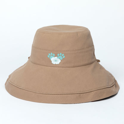 Beige wide brim sun hat with floral design on a white background