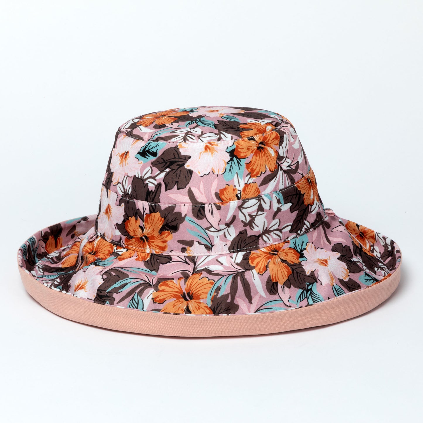 Floral patterned wide brim sun hat on a white background