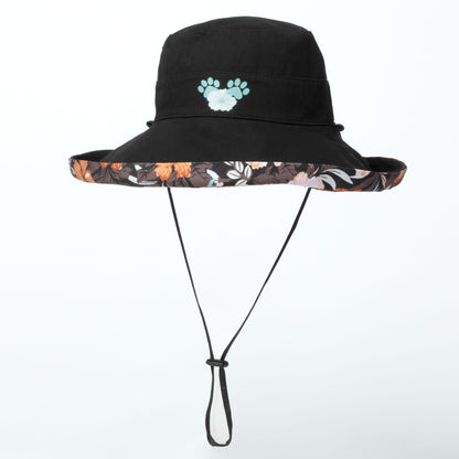 Black bucket hat with floral brim and paw print design on a white background