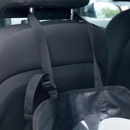 A black car seat organizer bag hanging from a car headrest on the back of a black car seat, with a clear plastic insert inside.