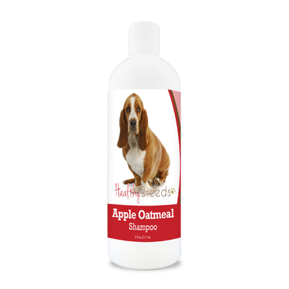 Bottle of apple oatmeal shampoo for dogs featuring a specific dog breed on each label.