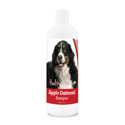Bottle of apple oatmeal shampoo for dogs featuring a specific dog breed on each label.
