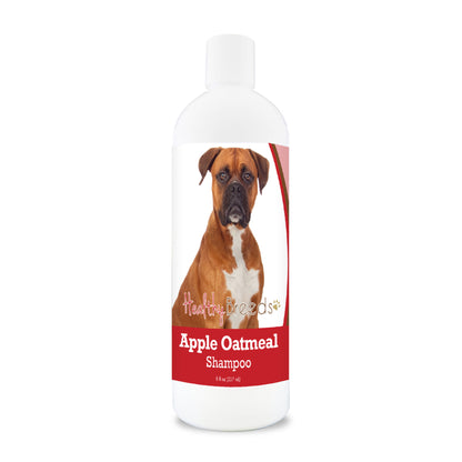 Bottle of apple oatmeal shampoo for dogs featuring specific dog breeds on each label.