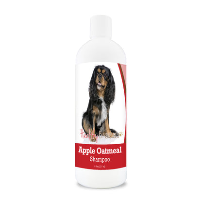 Bottle of apple oatmeal shampoo for dogs featuring a specific dog breed on each label.