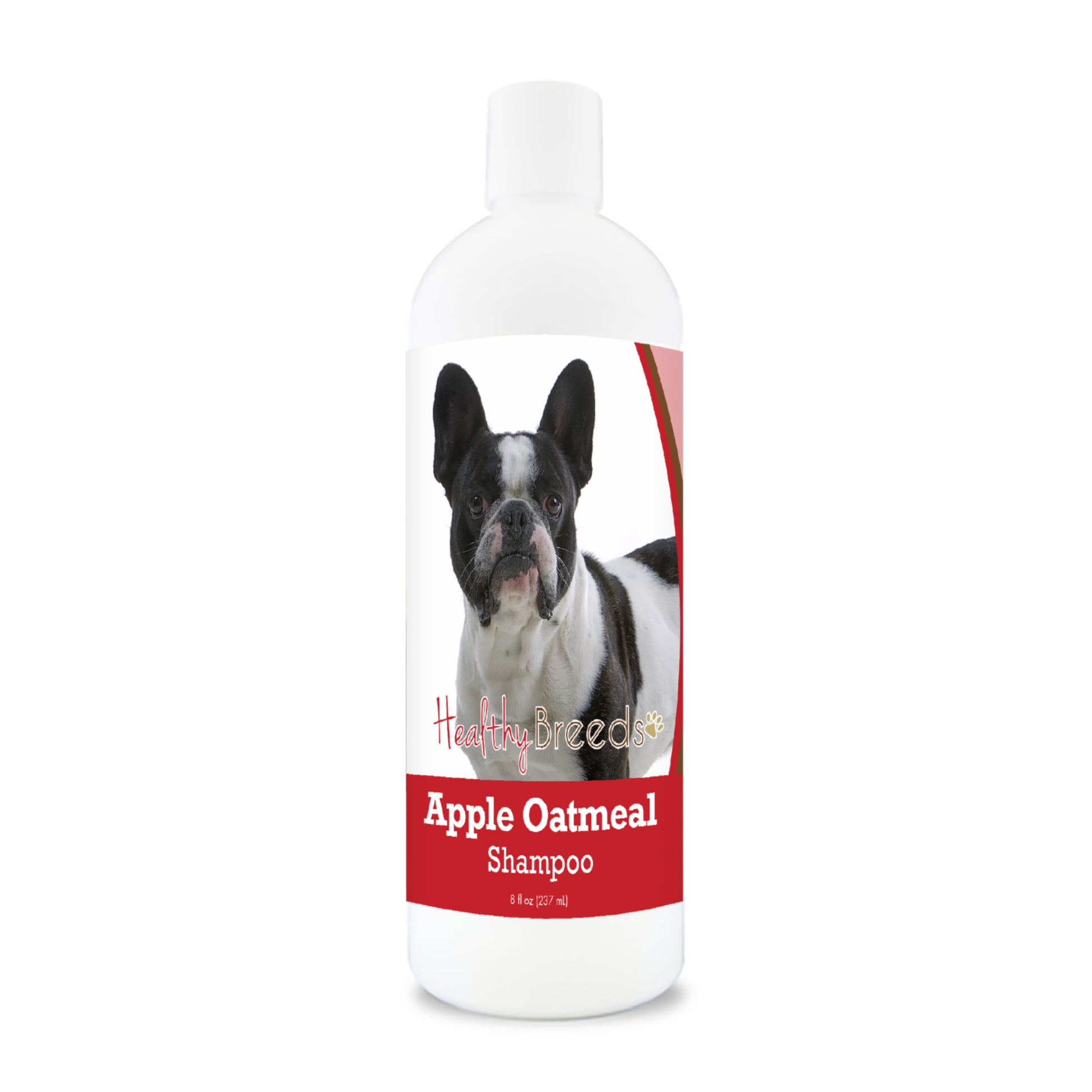 Bottle of apple oatmeal shampoo for dogs featuring specific dog breeds on each label.