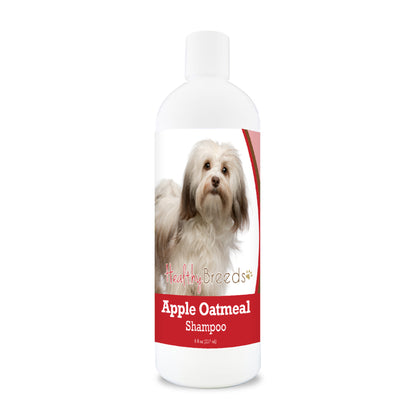 Bottle of apple oatmeal shampoo for dogs featuring a specific dog breed on each label.