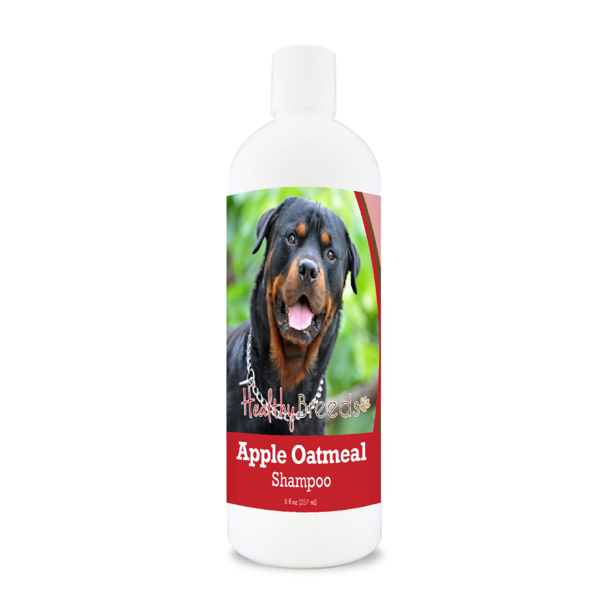 Bottle of apple oatmeal shampoo for dogs featuring specific dog breeds on each label.