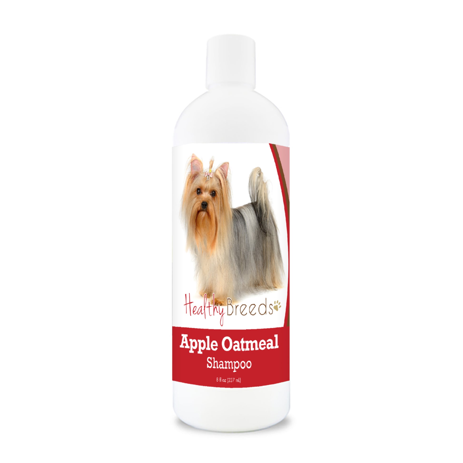 Bottle of apple oatmeal shampoo for dogs featuring specific dog breeds on each label.