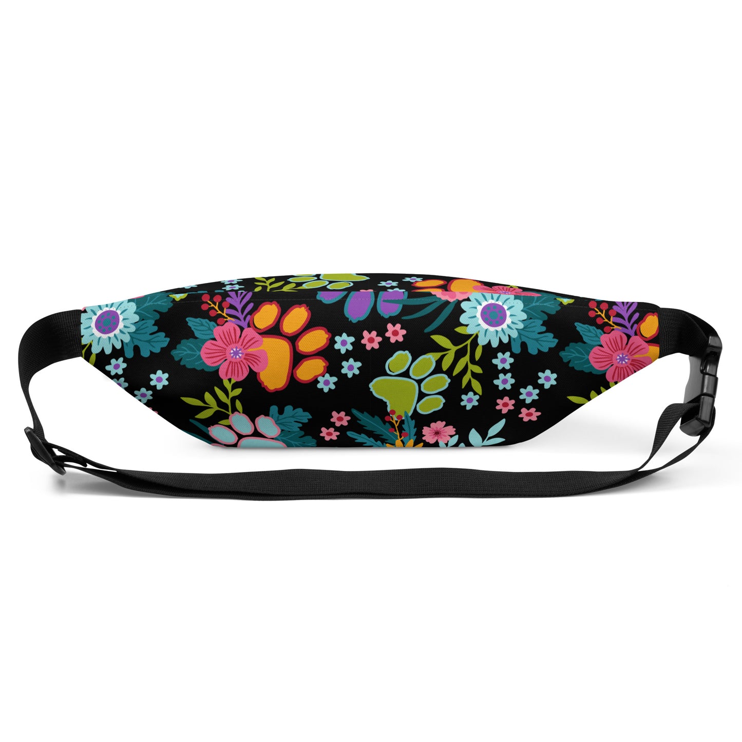 Floral Paw print pattern with a black background on a fanny pack with a black strap. Back view showing the clip.