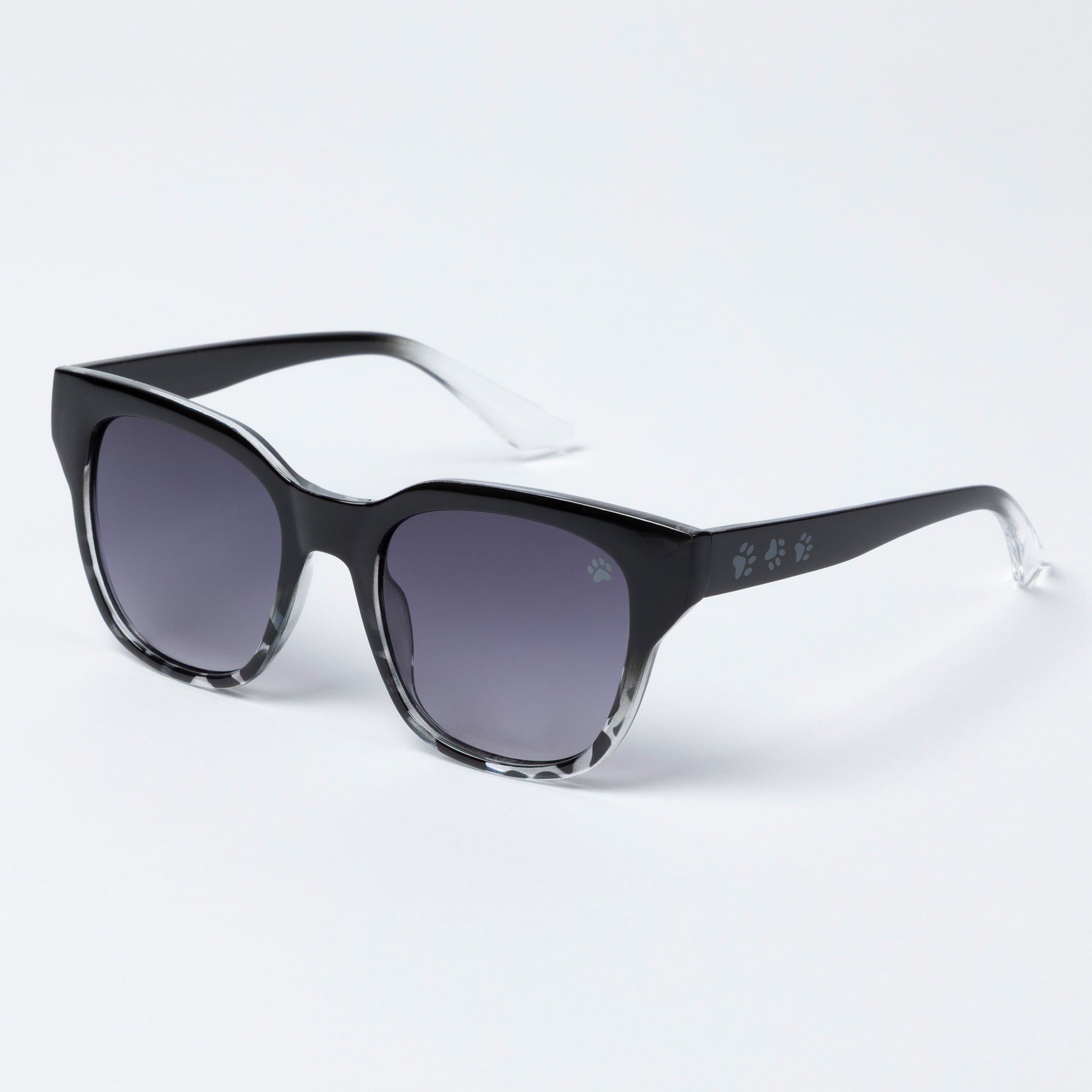 Black sunglasses with gradient lenses on a white background