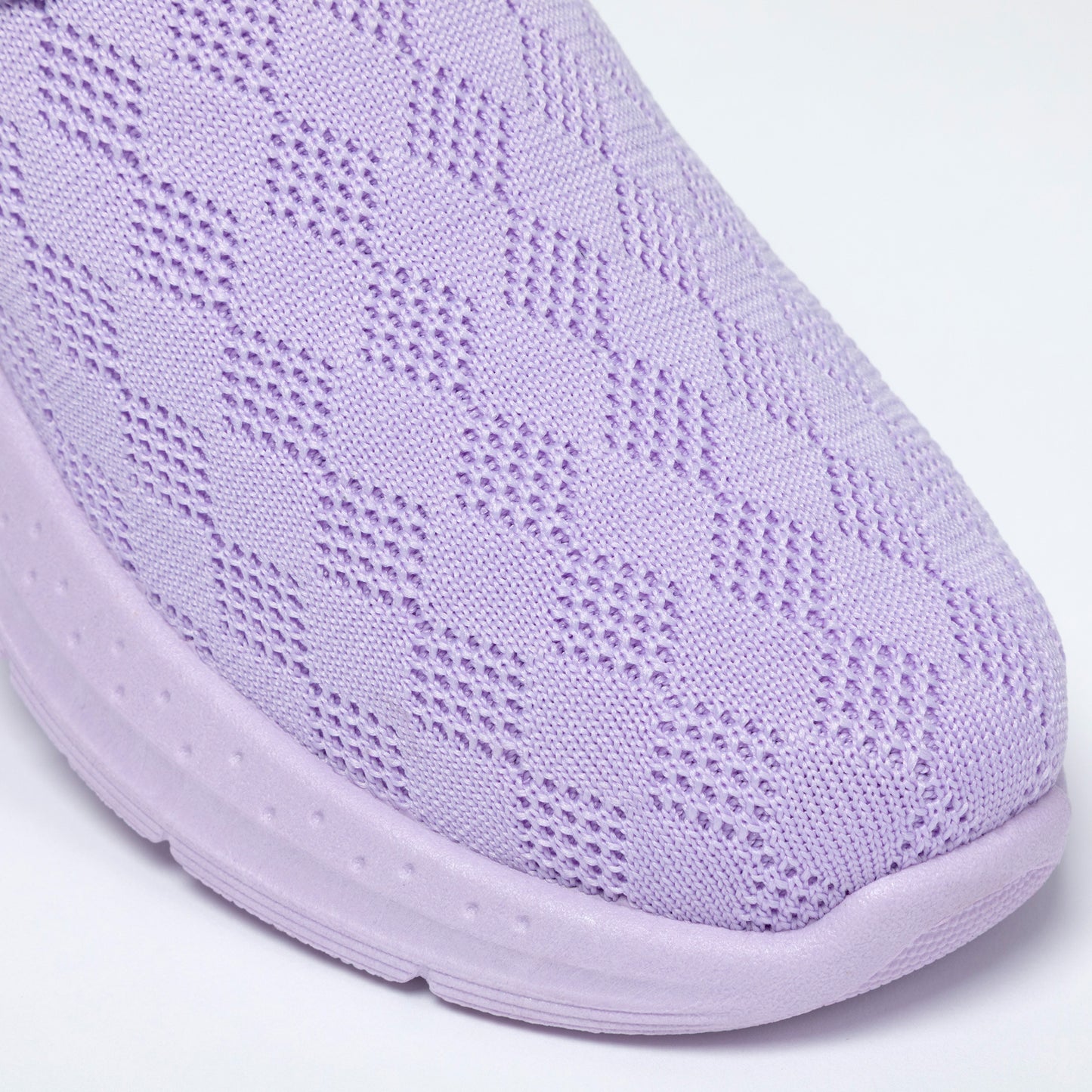 Close-up of a light purple clog on a white background